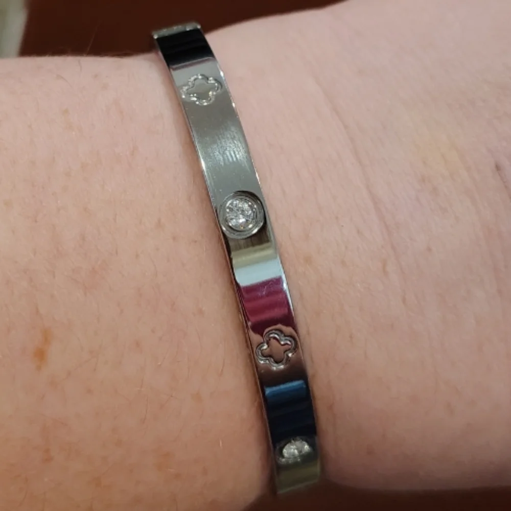 Elegant Silver Colored Bracelet with Crystal Accents Hinged Closure - Picture 1 of 7